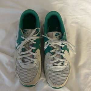 Nike Green and White Athletic Shoes with Classic Design